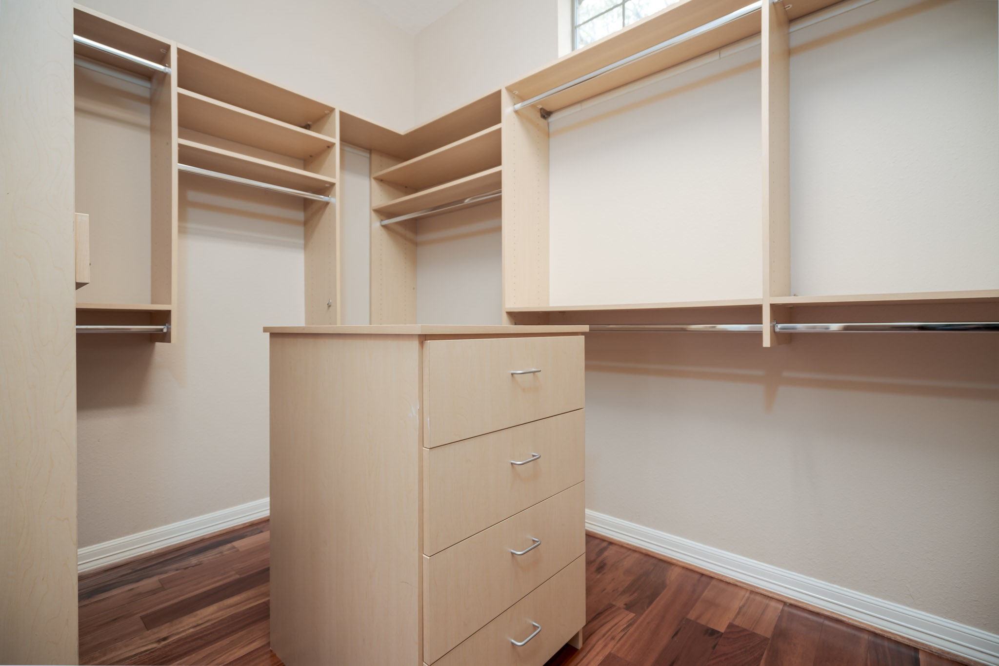 6506 Monte Bello Ridge Lane Houston, TX 77041 - Photo 12 of 35 a view of walk in closet with empty racks