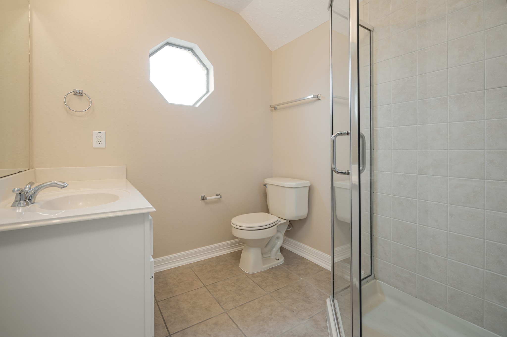 6506 Monte Bello Ridge Lane Houston, TX 77041 - Photo 21 of 35 a bathroom with a toilet sink and mirror