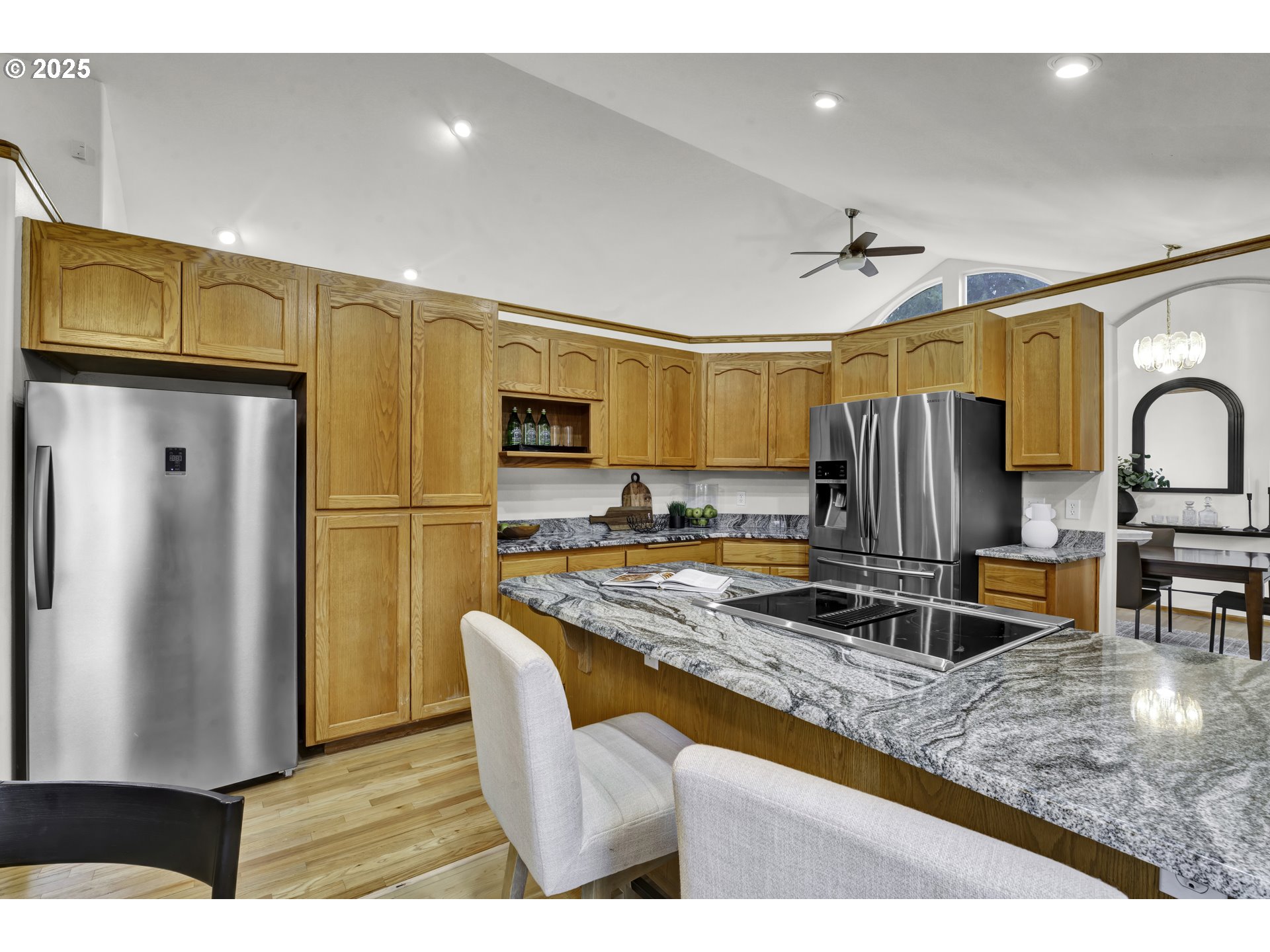1002 South 69th Street Springfield, OR 97478 - Photo 11 of 44 a kitchen with stainless steel appliances granite countertop a refrigerator a stove and a sink