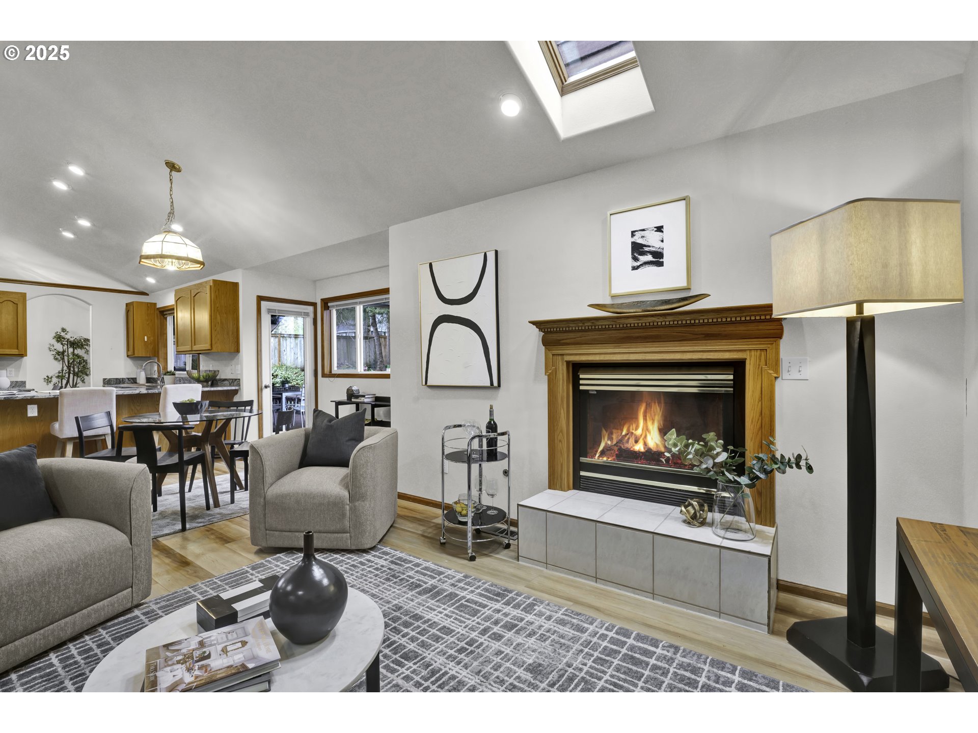 1002 South 69th Street Springfield, OR 97478 - Photo 14 of 44 a living room with furniture a window and a fireplace