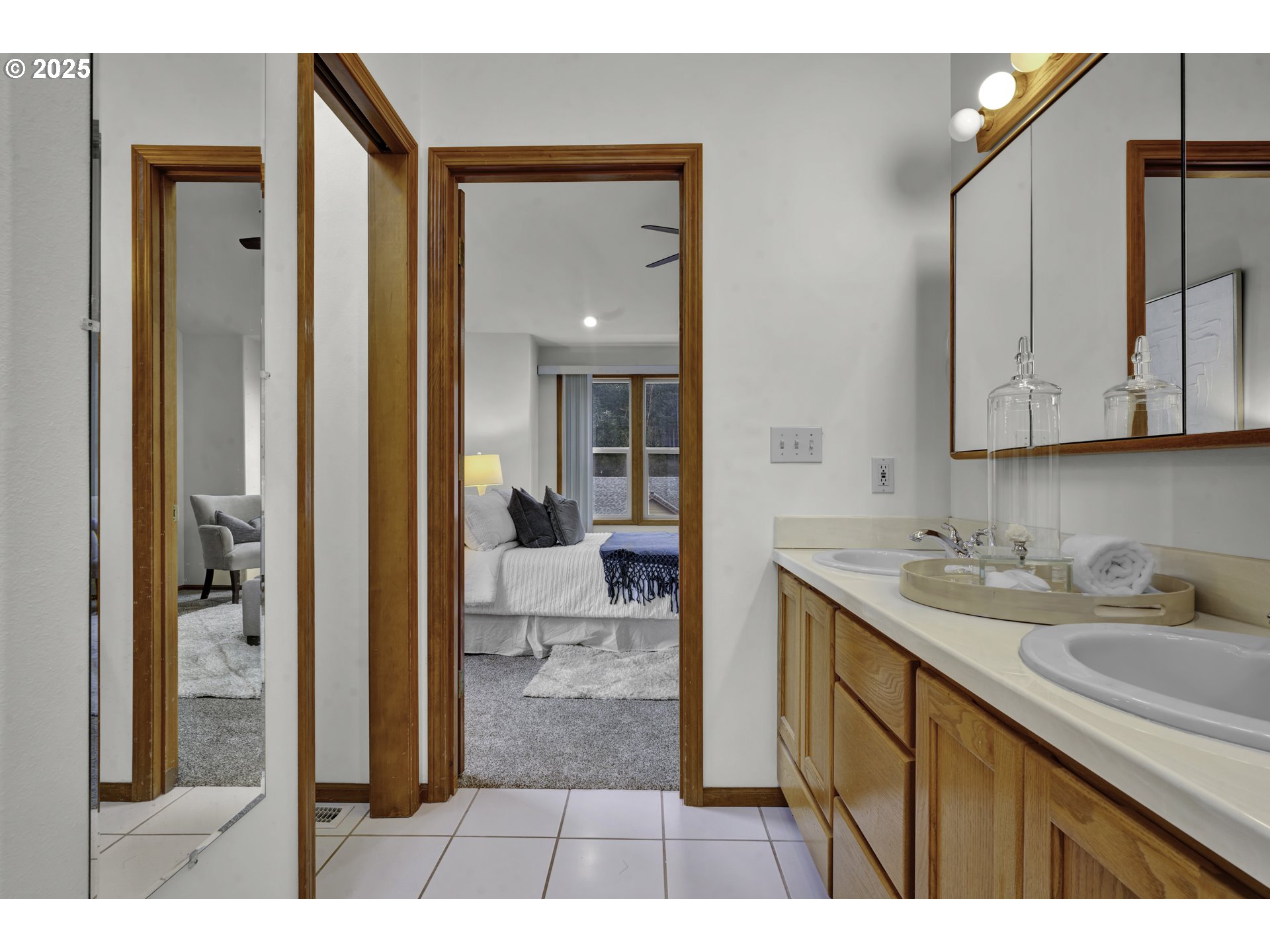 1002 South 69th Street Springfield, OR 97478 - Photo 25 of 44 a bathroom with a sink and a mirror