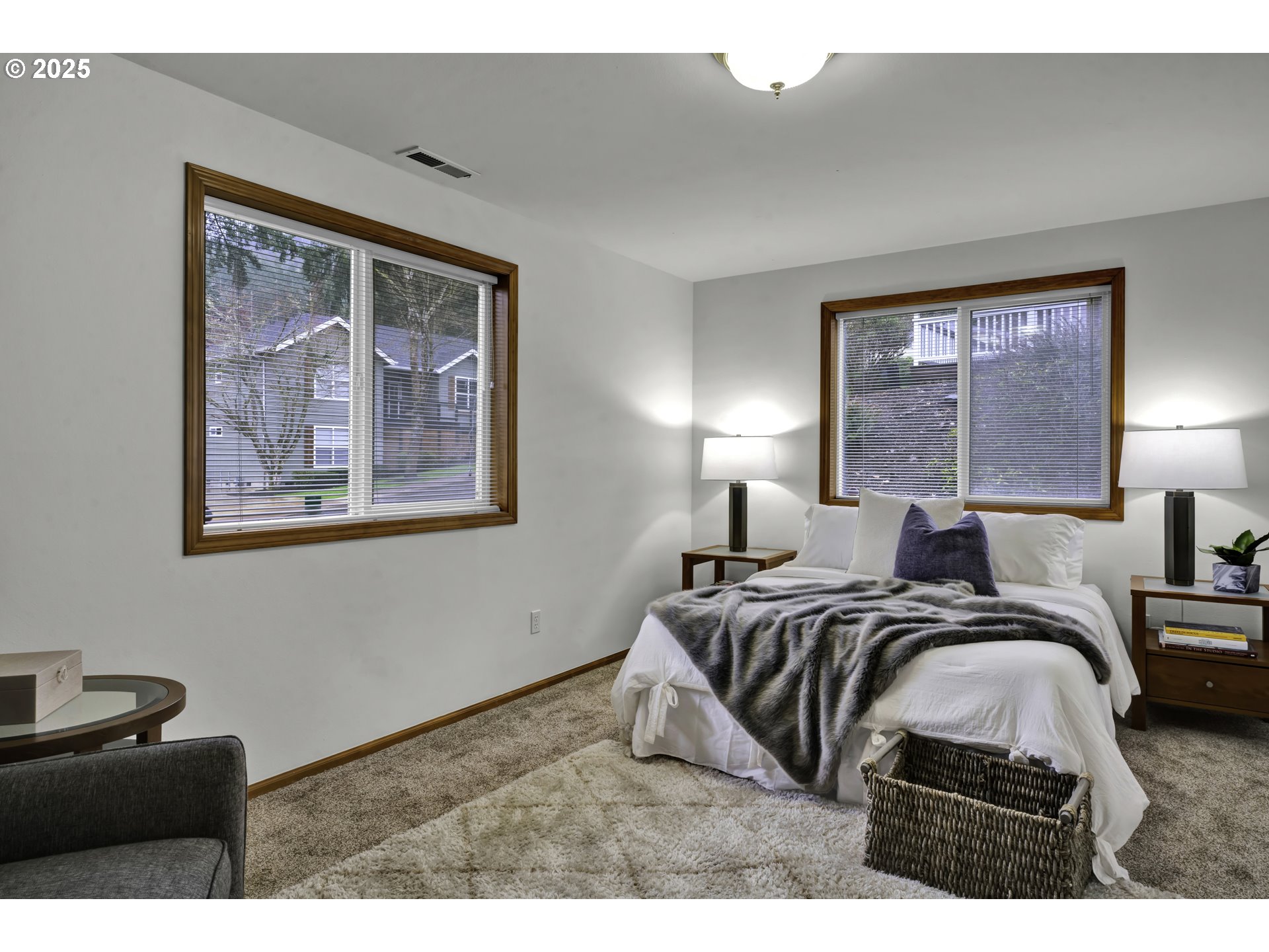 1002 South 69th Street Springfield, OR 97478 - Photo 27 of 44 a bedroom with a bed and a painting on the wall