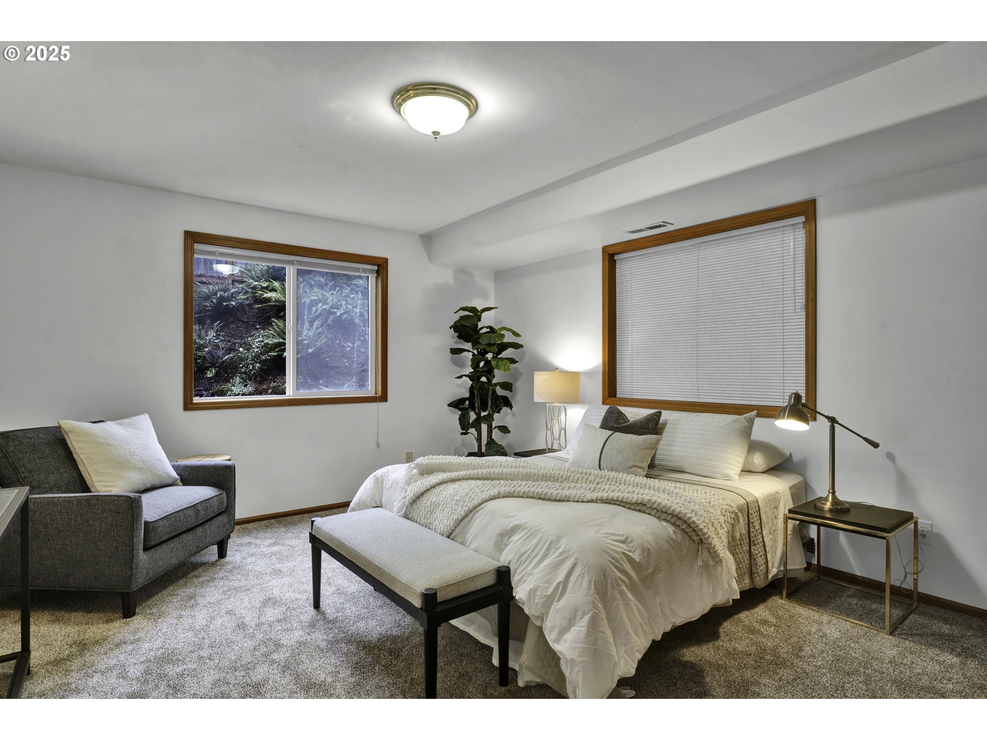 1002 South 69th Street Springfield, OR 97478 - Photo 30 of 44 a bedroom with a bed and a couch