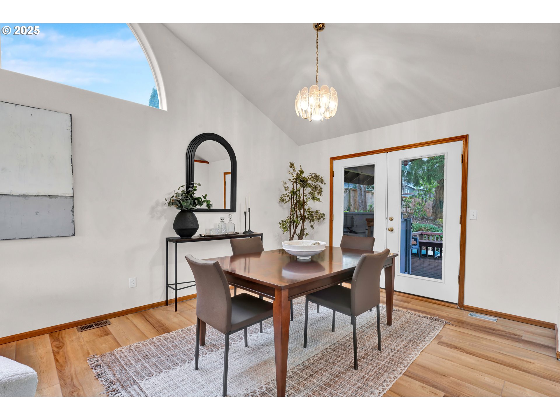 1002 South 69th Street Springfield, OR 97478 - Photo 7 of 44 a view of a dining room with furniture and wooden floor