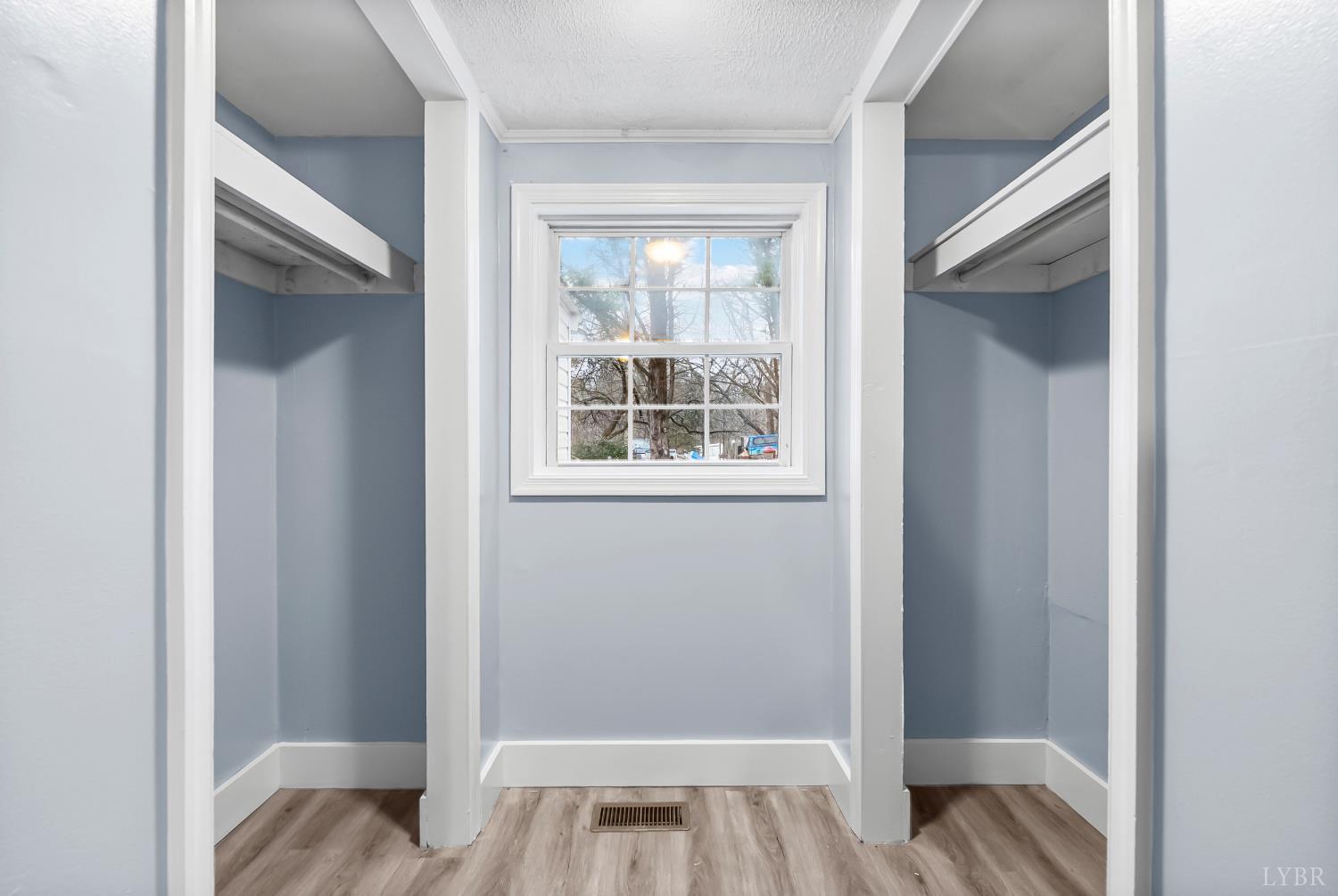 2443 Sunnymeade Road Rustburg, VA 24588 - Photo 16 of 36 a view of bedroom with window and wooden floor