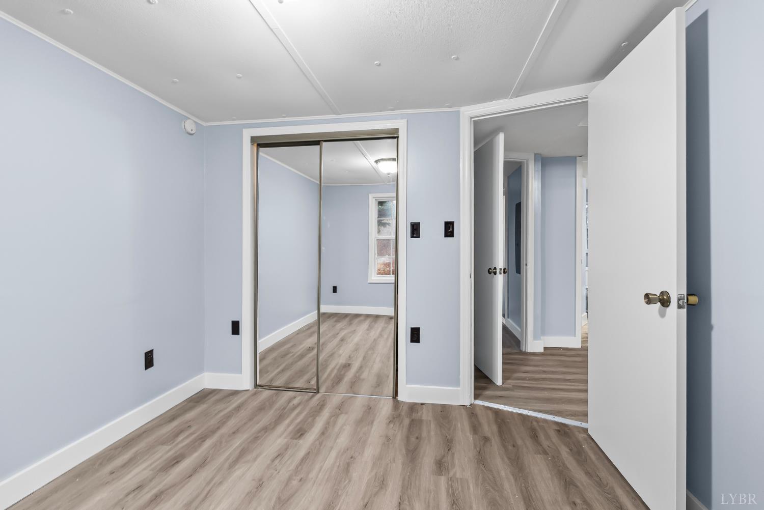 2443 Sunnymeade Road Rustburg, VA 24588 - Photo 21 of 36 wooden floor and closet in a room