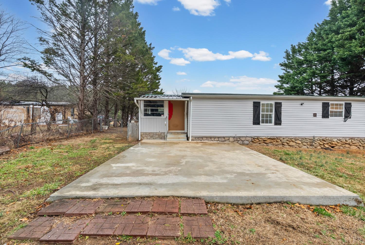 2443 Sunnymeade Road Rustburg, VA 24588 - Photo 31 of 36 a backyard of a house