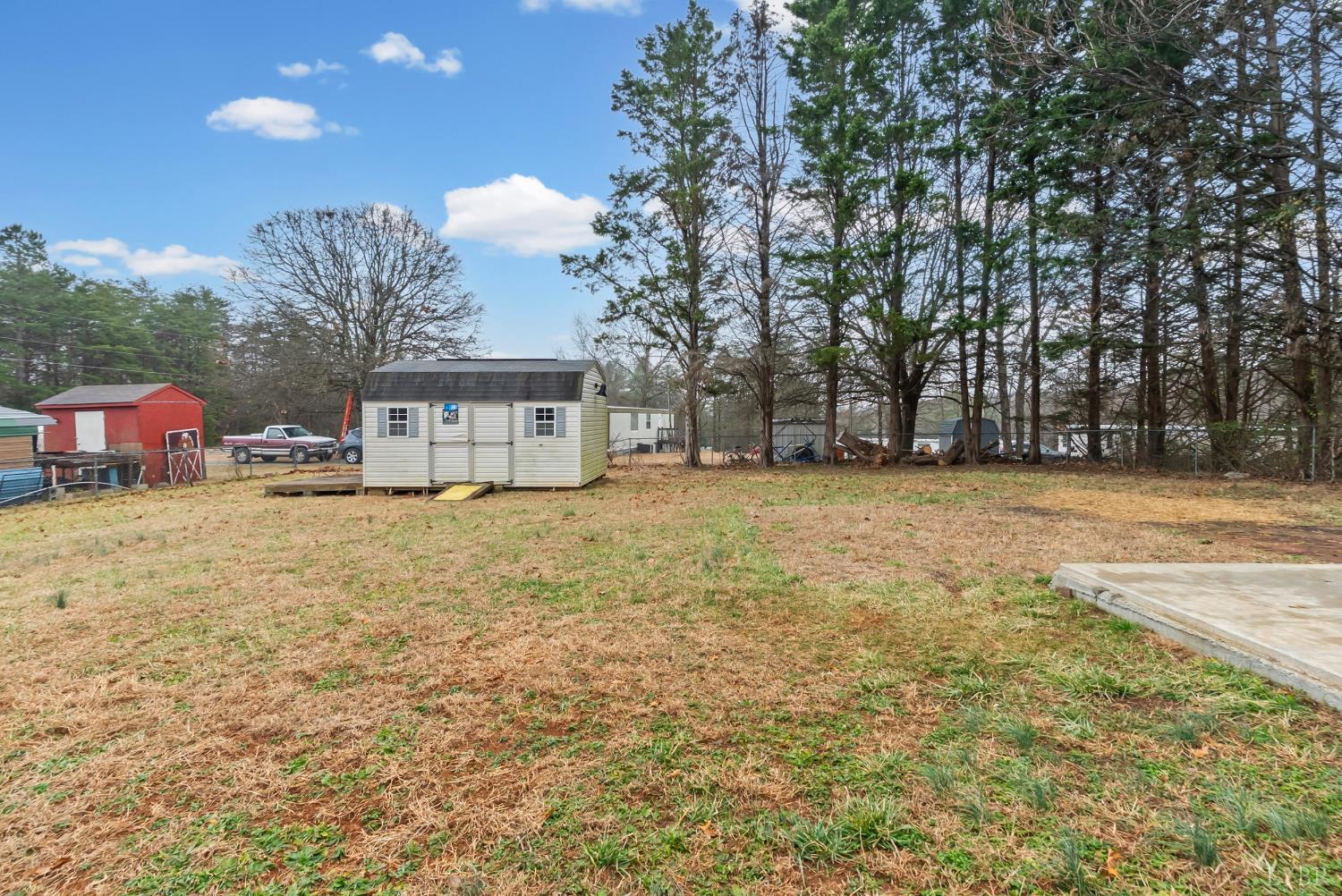2443 Sunnymeade Road Rustburg, VA 24588 - Photo 33 of 36 a view of a house with a yard