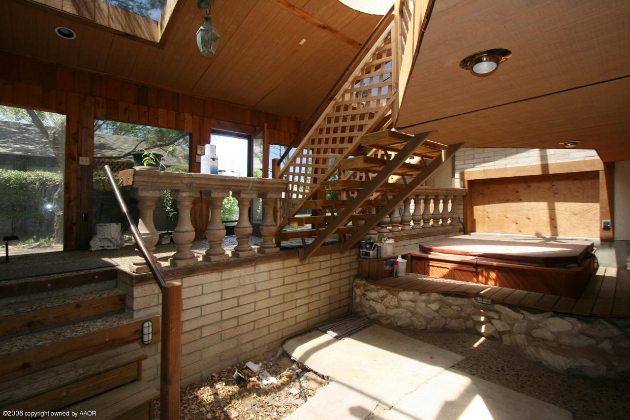 4250 Arden Road Amarillo, TX 79110 - Photo 4 of 22 a view of entryway with wooden stairs