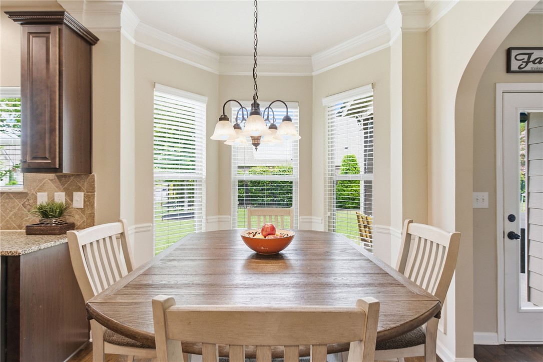 138 Buckland Drive Anderson, SC 29621 - Photo 14 of 49 This dining area features crown molding, providing an elegant setting for gatherings.