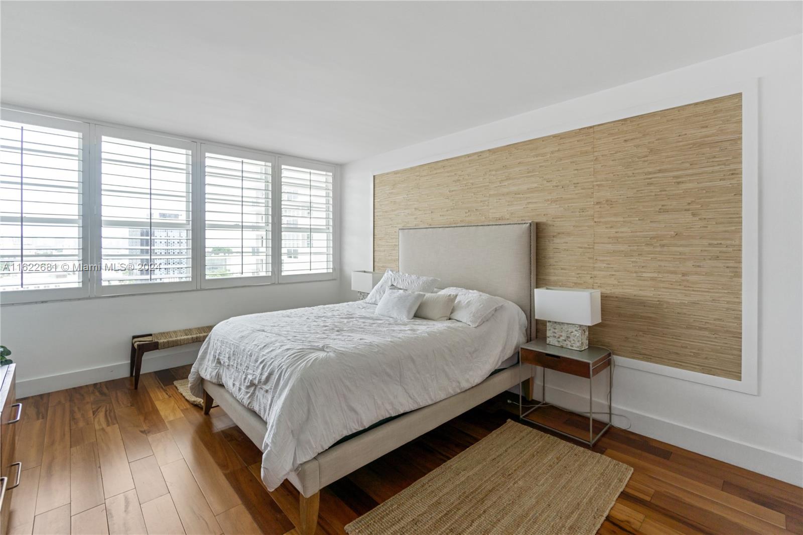 100 Lincoln Road, Unit 1422 Miami Beach, FL 33139 - Photo 13 of 35 a bedroom with a bed and a window