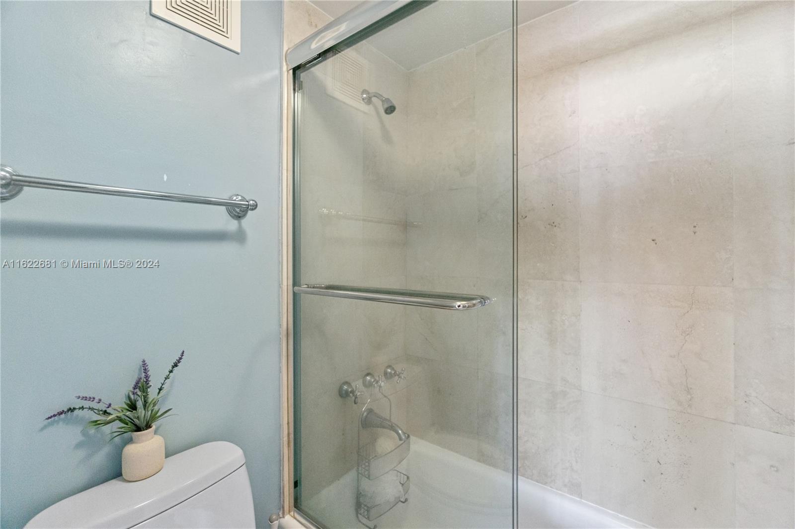 100 Lincoln Road, Unit 1422 Miami Beach, FL 33139 - Photo 22 of 35 a bathroom with a shower and a toilet