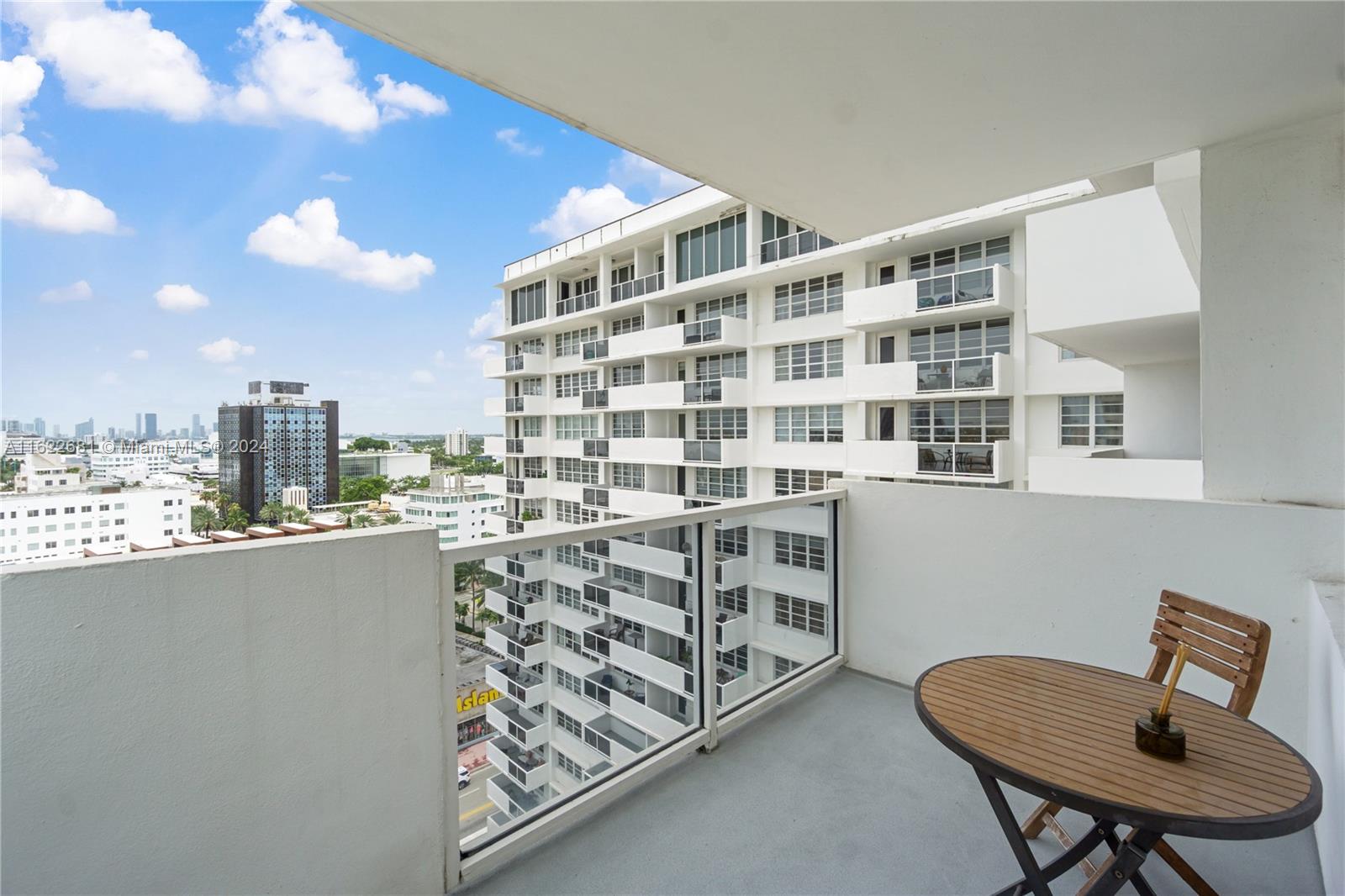 100 Lincoln Road, Unit 1422 Miami Beach, FL 33139 - Photo 24 of 35 a view of a chair and table in a room