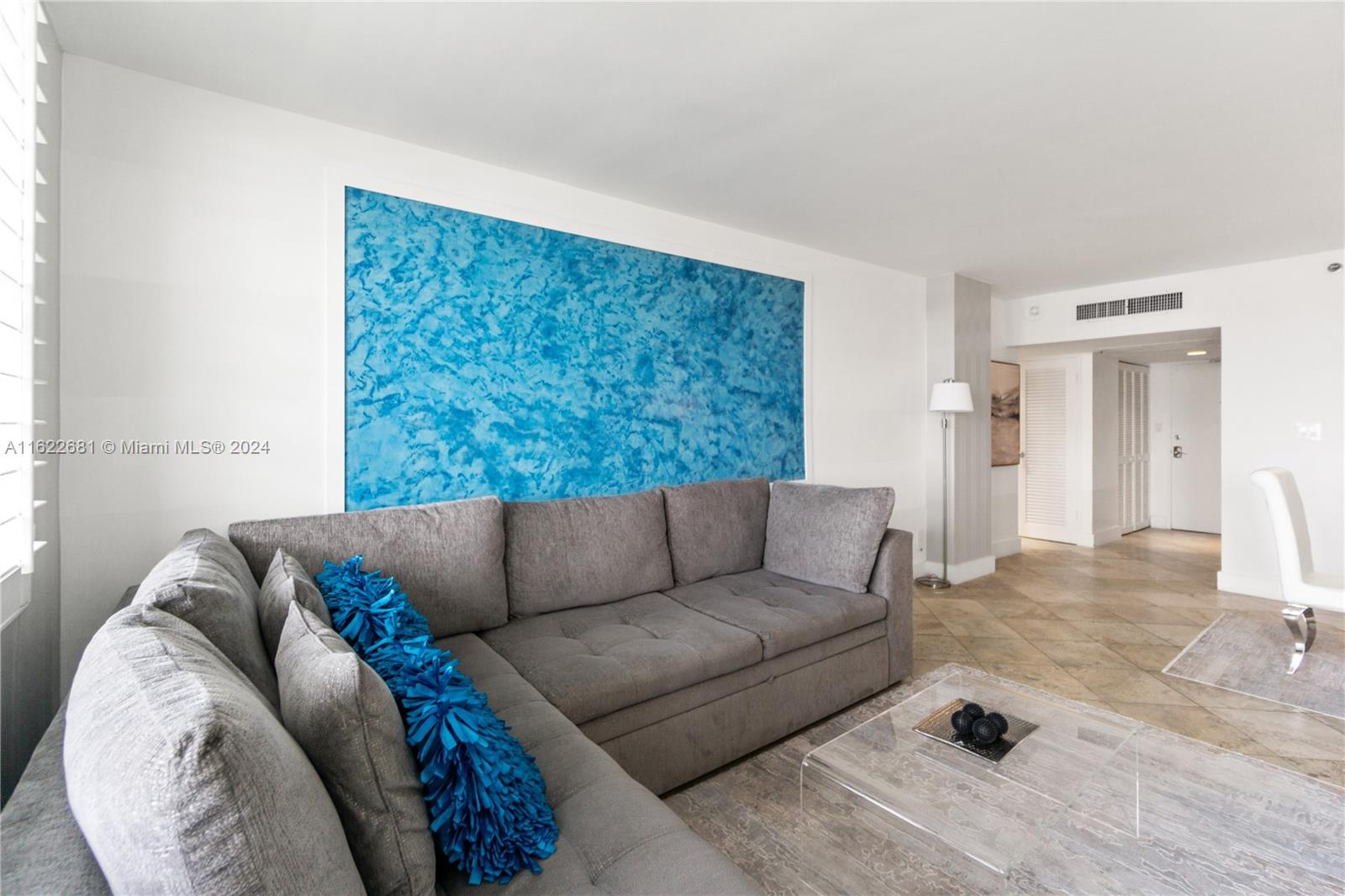 100 Lincoln Road, Unit 1422 Miami Beach, FL 33139 - Photo 3 of 35 a living room with furniture and a couch