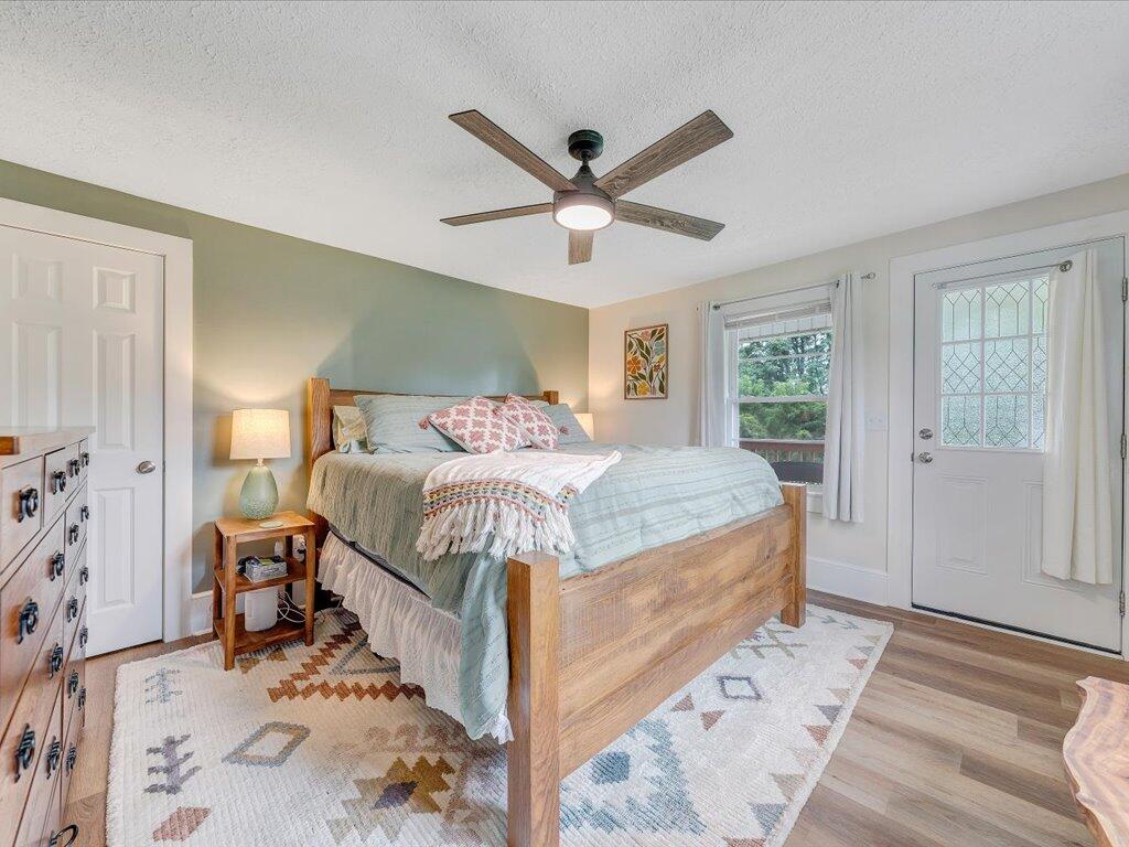 214 Spring Road Patrick Springs, VA 24133 - Photo 18 of 49 a bedroom with a bed and a window