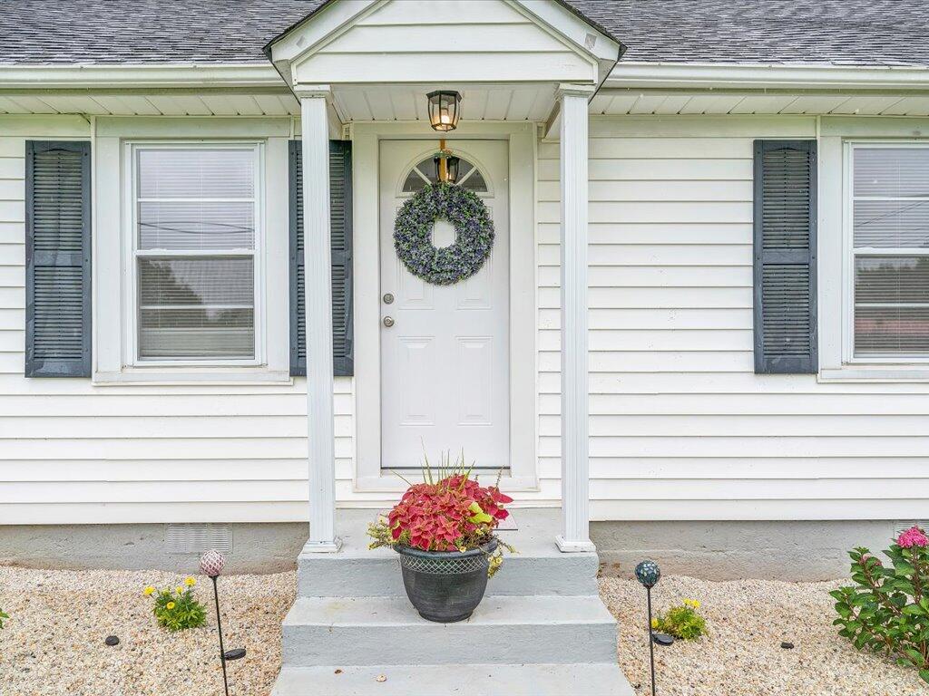 214 Spring Road Patrick Springs, VA 24133 - Photo 2 of 49 a front view of a house with a porch