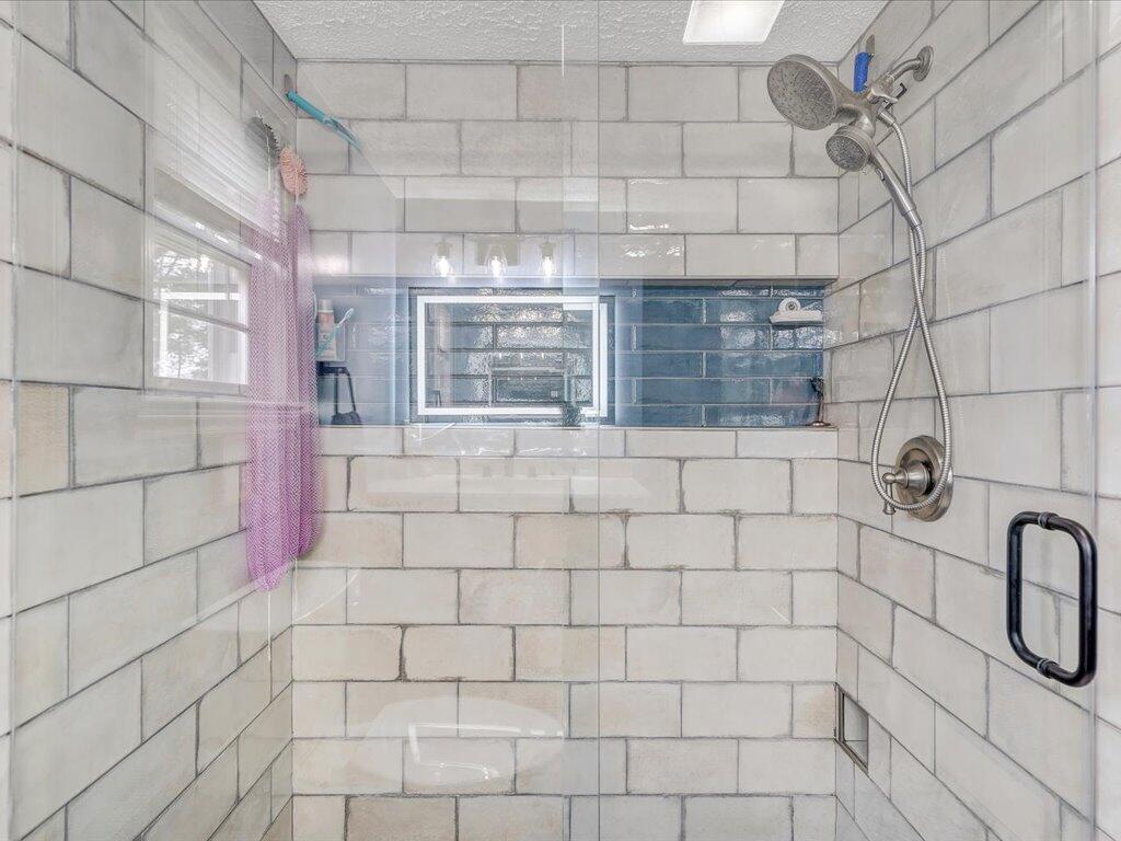 214 Spring Road Patrick Springs, VA 24133 - Photo 26 of 49 a bathroom with a shower