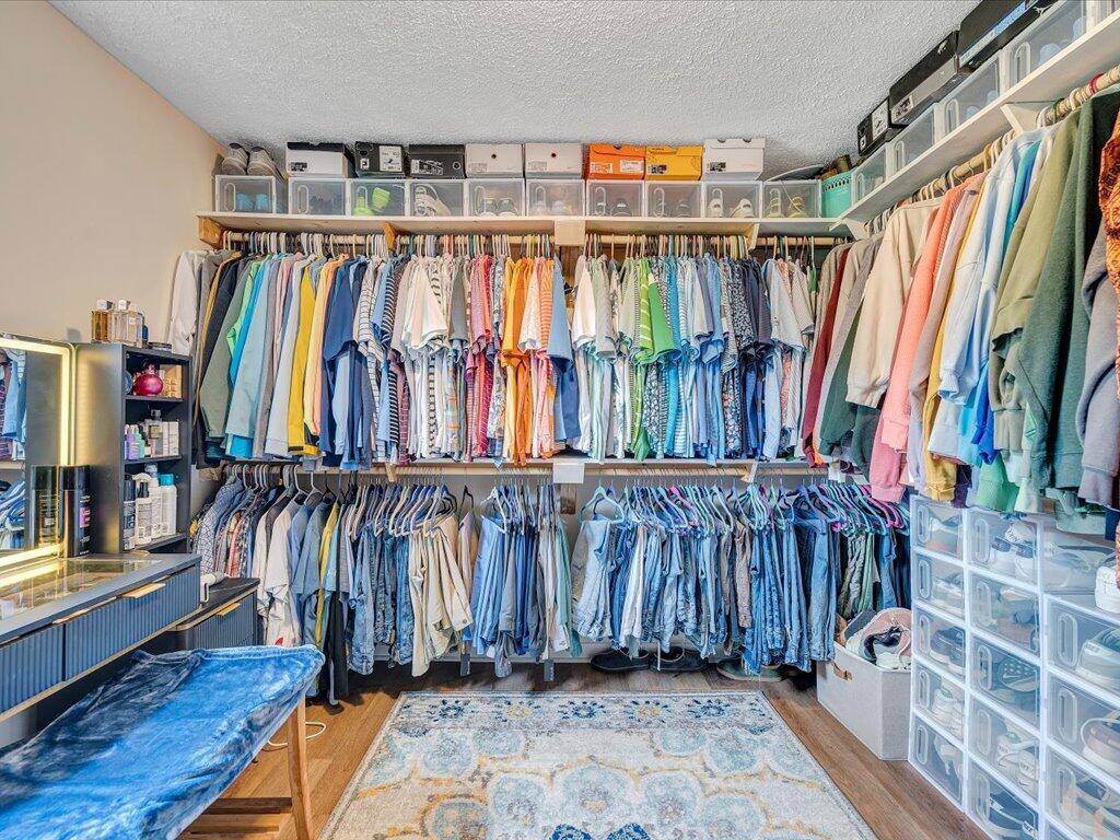214 Spring Road Patrick Springs, VA 24133 - Photo 29 of 49 a view of walk in closet with clothes and shoes