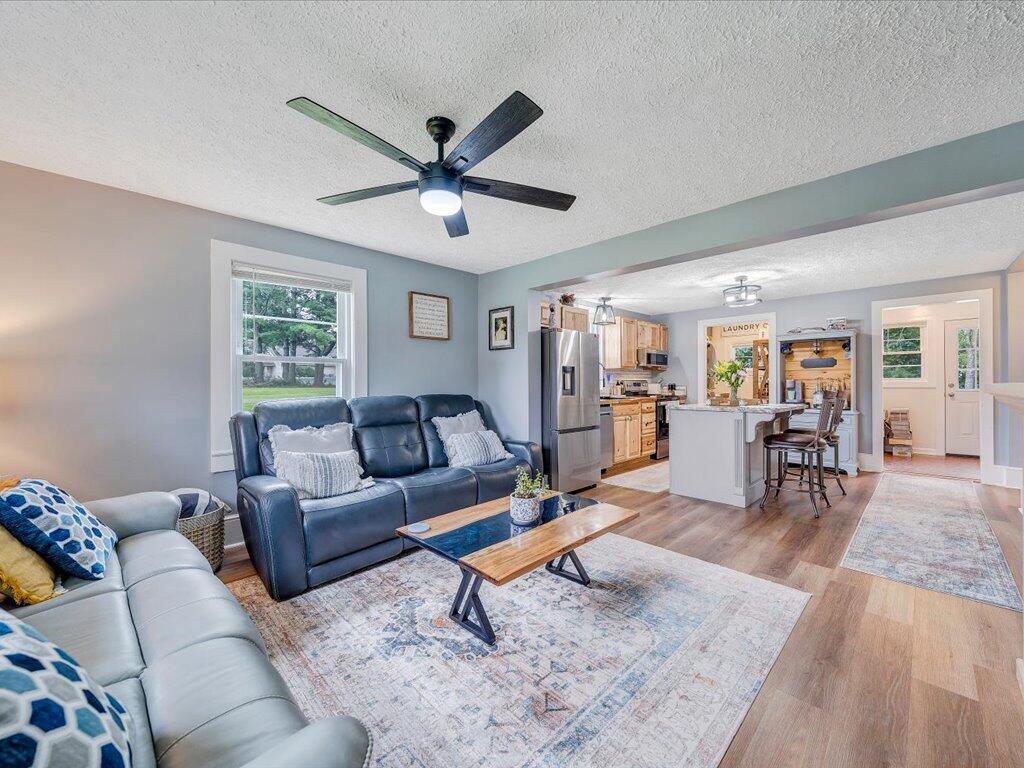 214 Spring Road Patrick Springs, VA 24133 - Photo 3 of 49 a living room with furniture and wooden floor