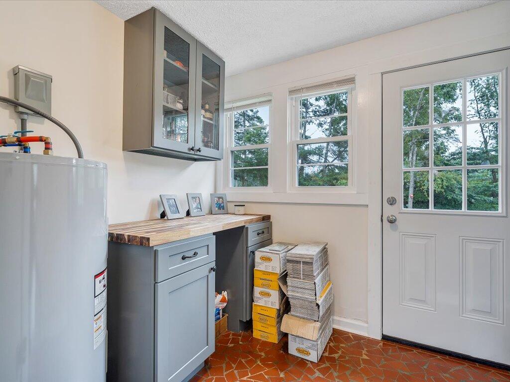 214 Spring Road Patrick Springs, VA 24133 - Photo 31 of 49 a view of a kitchen with cabinets and wooden floor