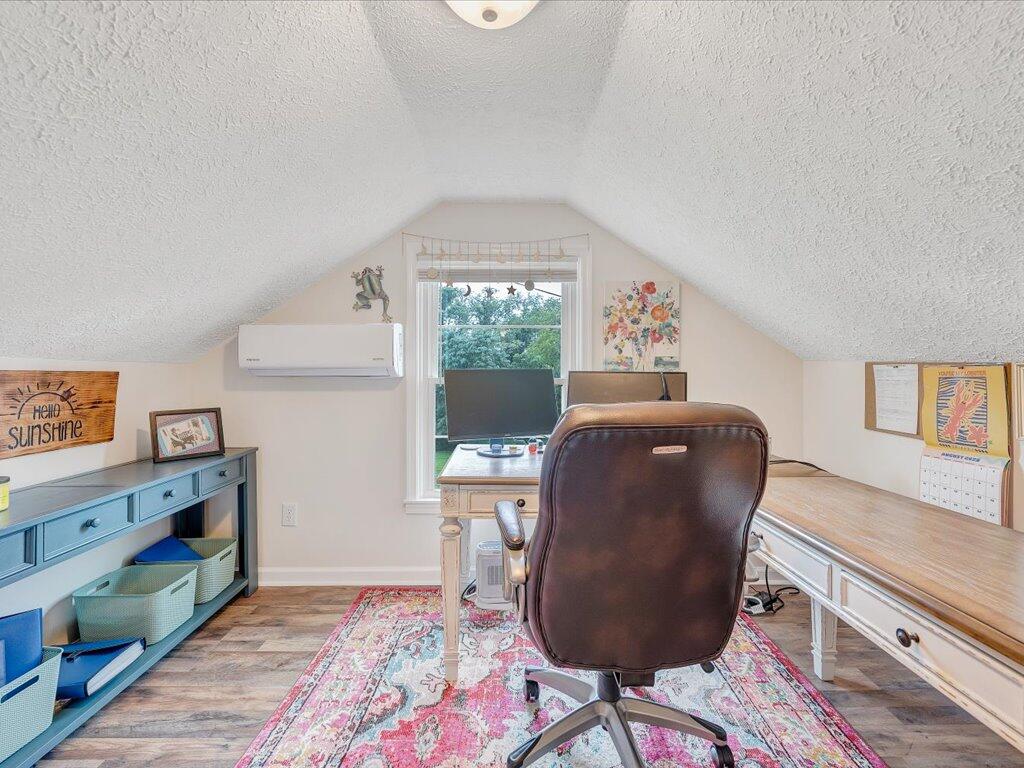 214 Spring Road Patrick Springs, VA 24133 - Photo 32 of 49 a workspace with furniture and window