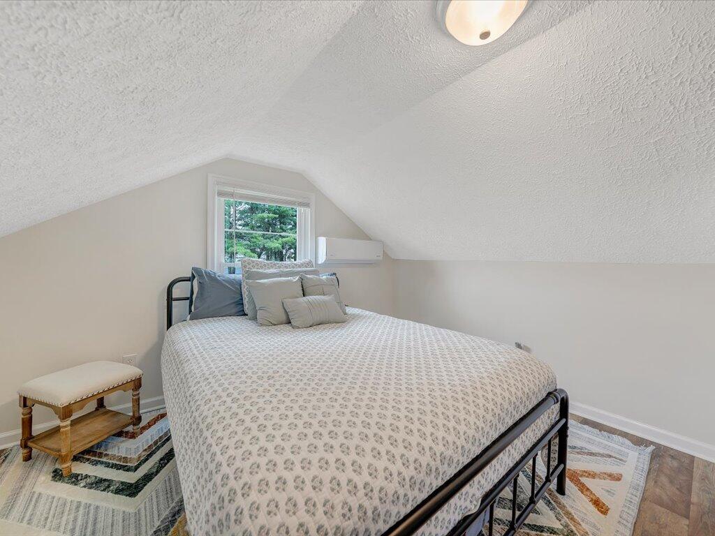 214 Spring Road Patrick Springs, VA 24133 - Photo 35 of 49 a bedroom with a bed and window