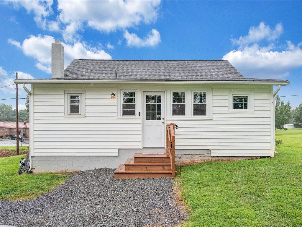 214 Spring Road Patrick Springs, VA 24133 - Photo 36 of 49 a front view of a house with a yard