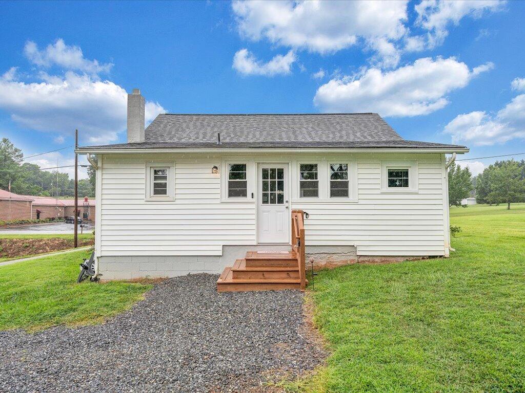 214 Spring Road Patrick Springs, VA 24133 - Photo 37 of 49 a front view of a house with garden