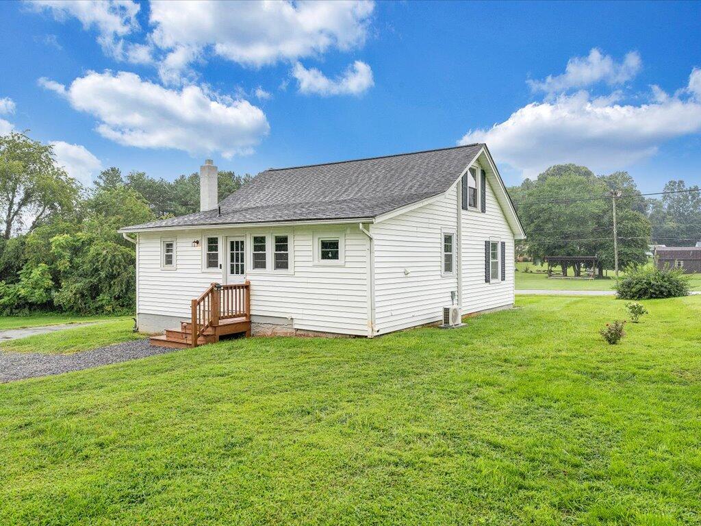 214 Spring Road Patrick Springs, VA 24133 - Photo 38 of 49 a view of a house with a yard