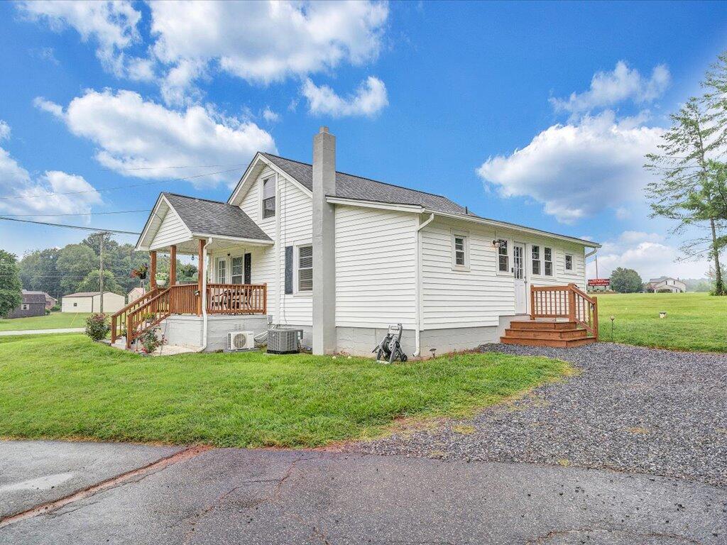 214 Spring Road Patrick Springs, VA 24133 - Photo 41 of 49 a front view of house with yard and entertaining space