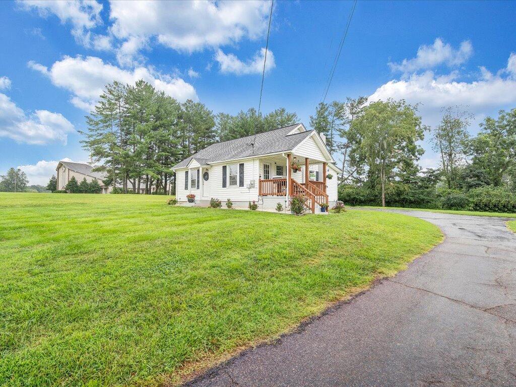 214 Spring Road Patrick Springs, VA 24133 - Photo 45 of 49 a view of house with garden