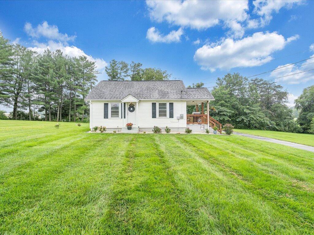214 Spring Road Patrick Springs, VA 24133 - Photo 47 of 49 a view of a house with a backyard