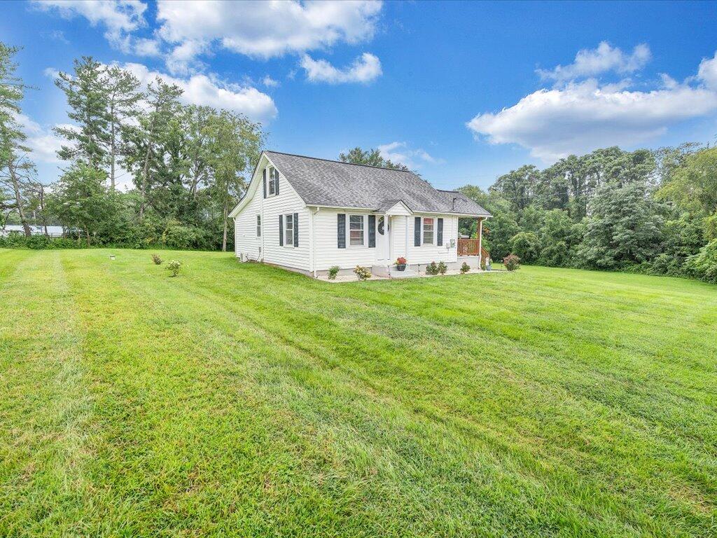 214 Spring Road Patrick Springs, VA 24133 - Photo 48 of 49 a view of a house with a big yard and large trees