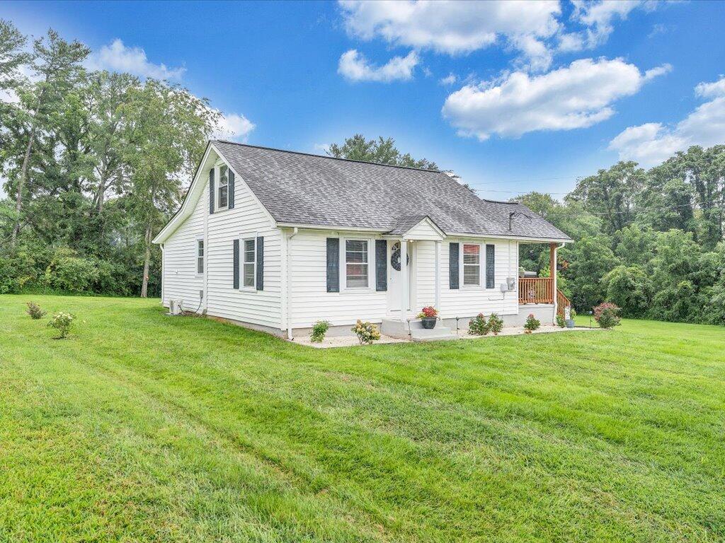 214 Spring Road Patrick Springs, VA 24133 - Photo 49 of 49 a view of a house with a backyard