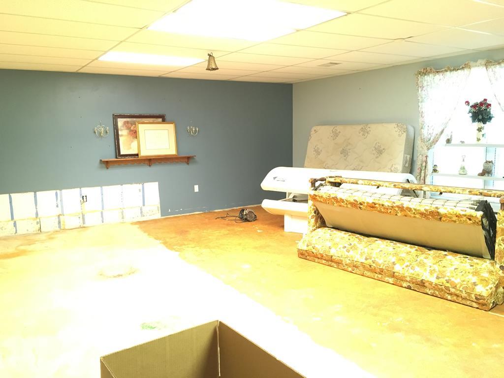 1064 Lee King Road Forsyth, GA 31029 - Photo 13 of 25 a bedroom with a bed and teddy bear on bed