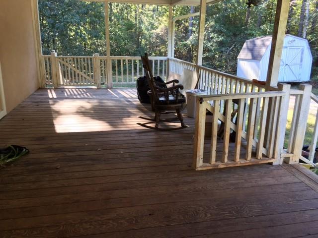 1064 Lee King Road Forsyth, GA 31029 - Photo 5 of 25 a view of a deck with wooden floor and fence