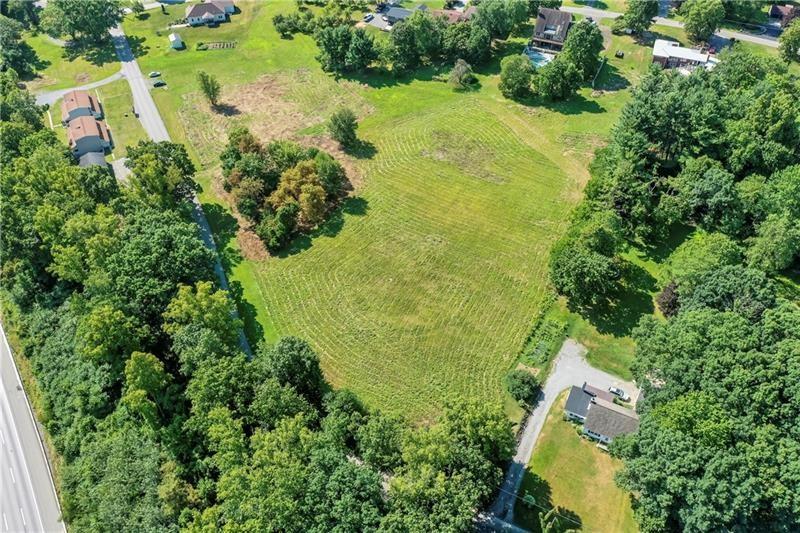 110 Douglass Road Beaver Falls, PA 15010 - Photo 14 of 18 an aerial view of residential house with swimming pool and green space