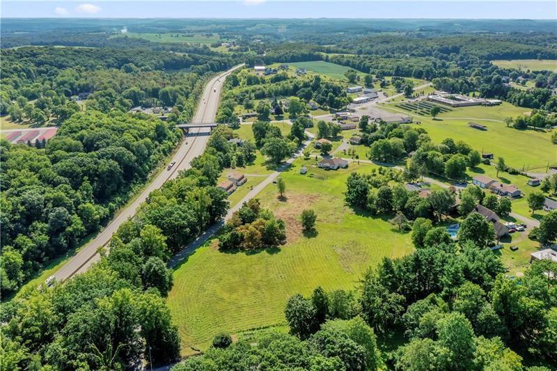 110 Douglass Road Beaver Falls, PA 15010 - Photo 15 of 18 an aerial view of residential houses with outdoor space and trees