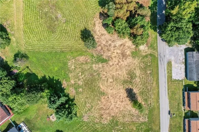 a view of a garden with an outdoor space