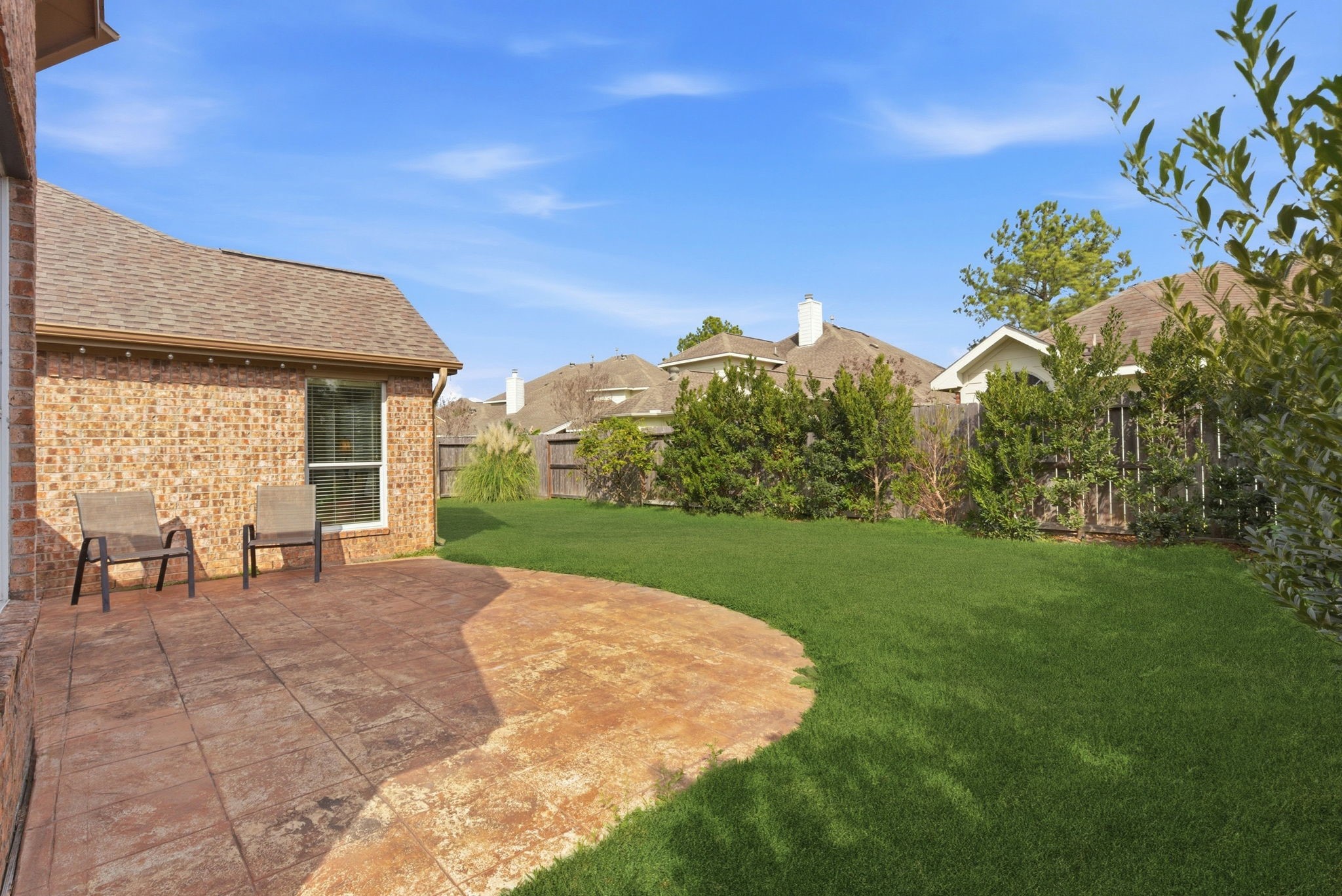 29814 Legends Pass Lane Spring, TX 77386 - Photo 42 of 46 a view of a house with backyard porch and garden