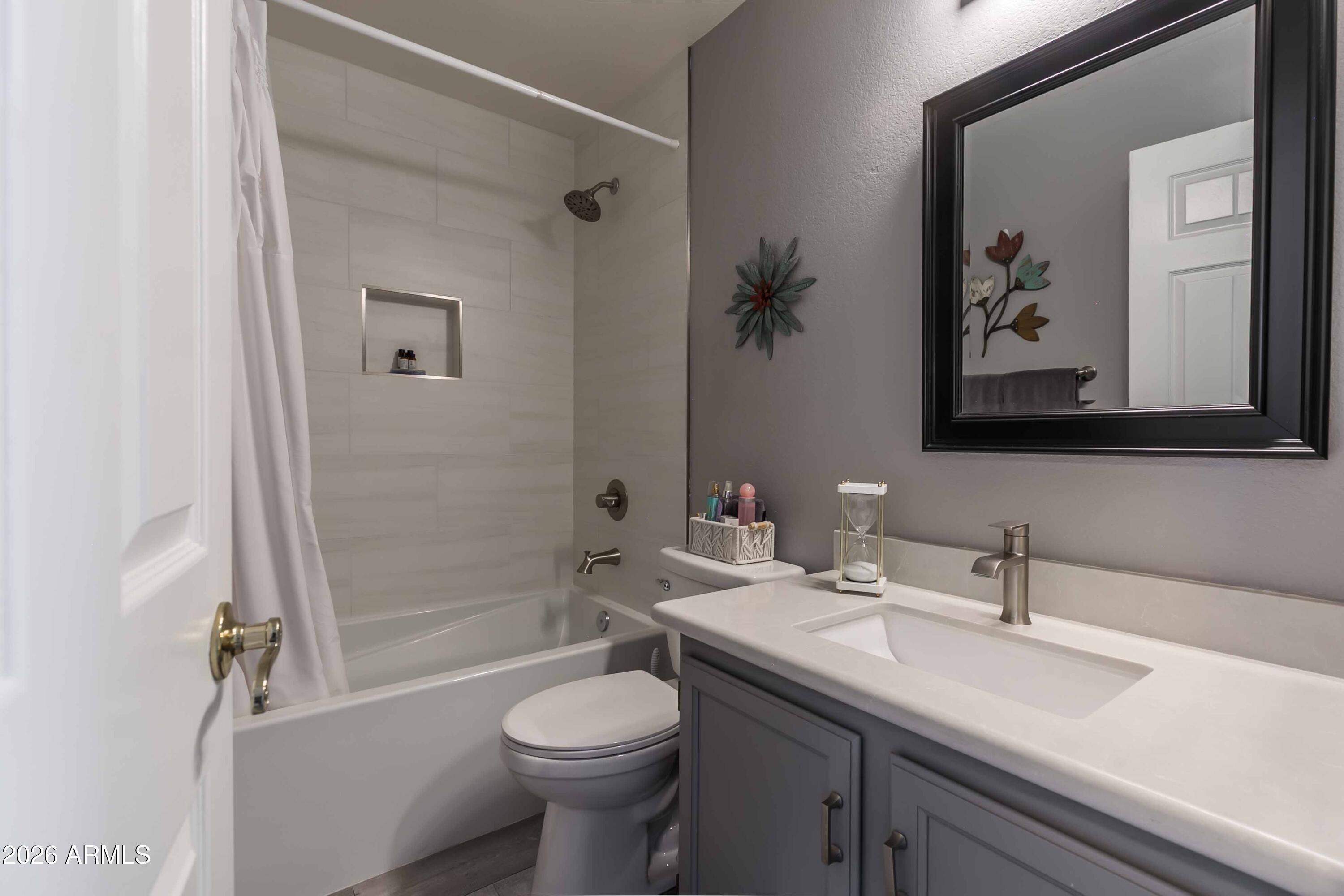 9705 East Mountain View Road, Unit 1107 Scottsdale, AZ 85258 - Photo 16 of 35 Upstairs Hall Bath