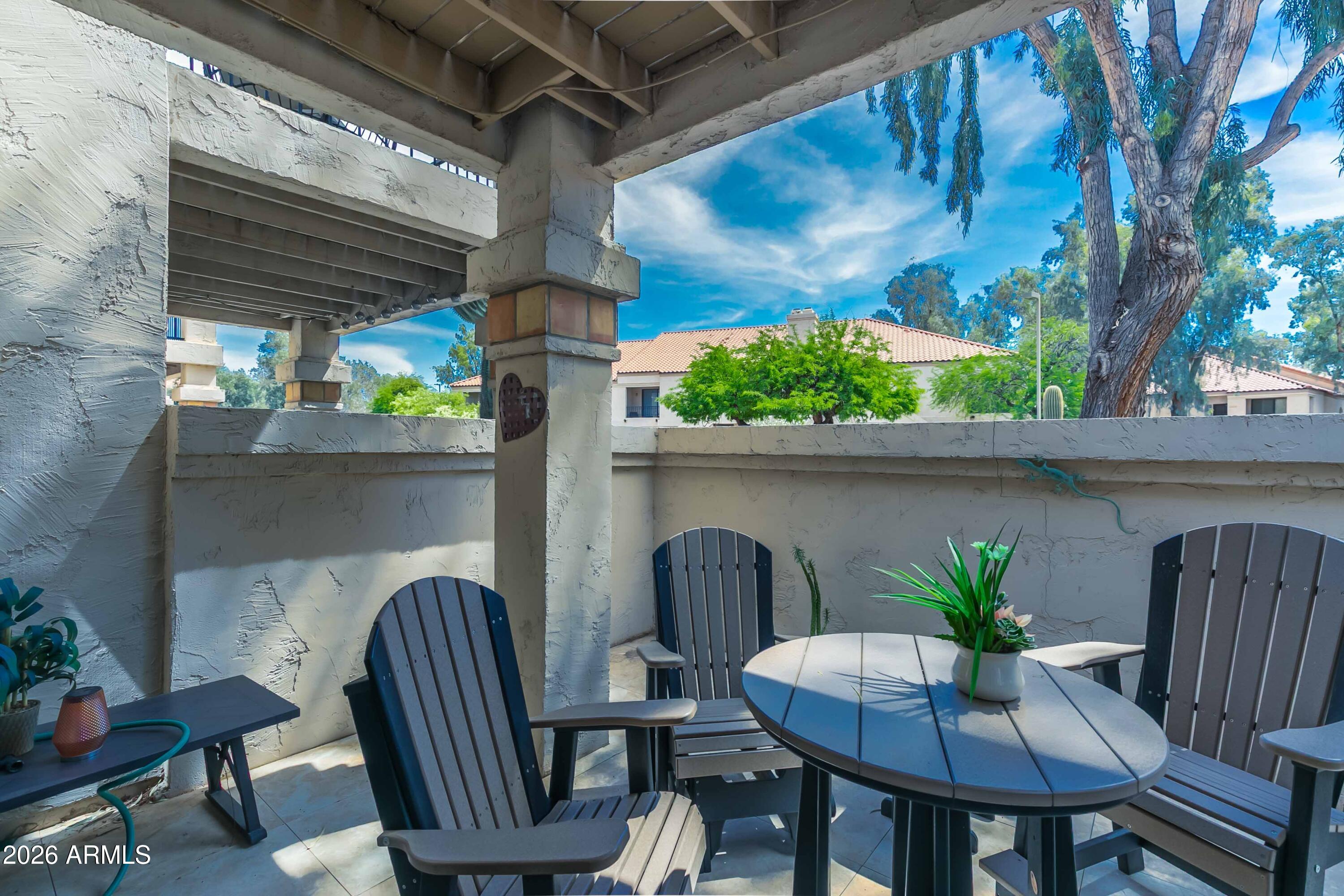 9705 East Mountain View Road, Unit 1107 Scottsdale, AZ 85258 - Photo 17 of 35 Back Patio Area
