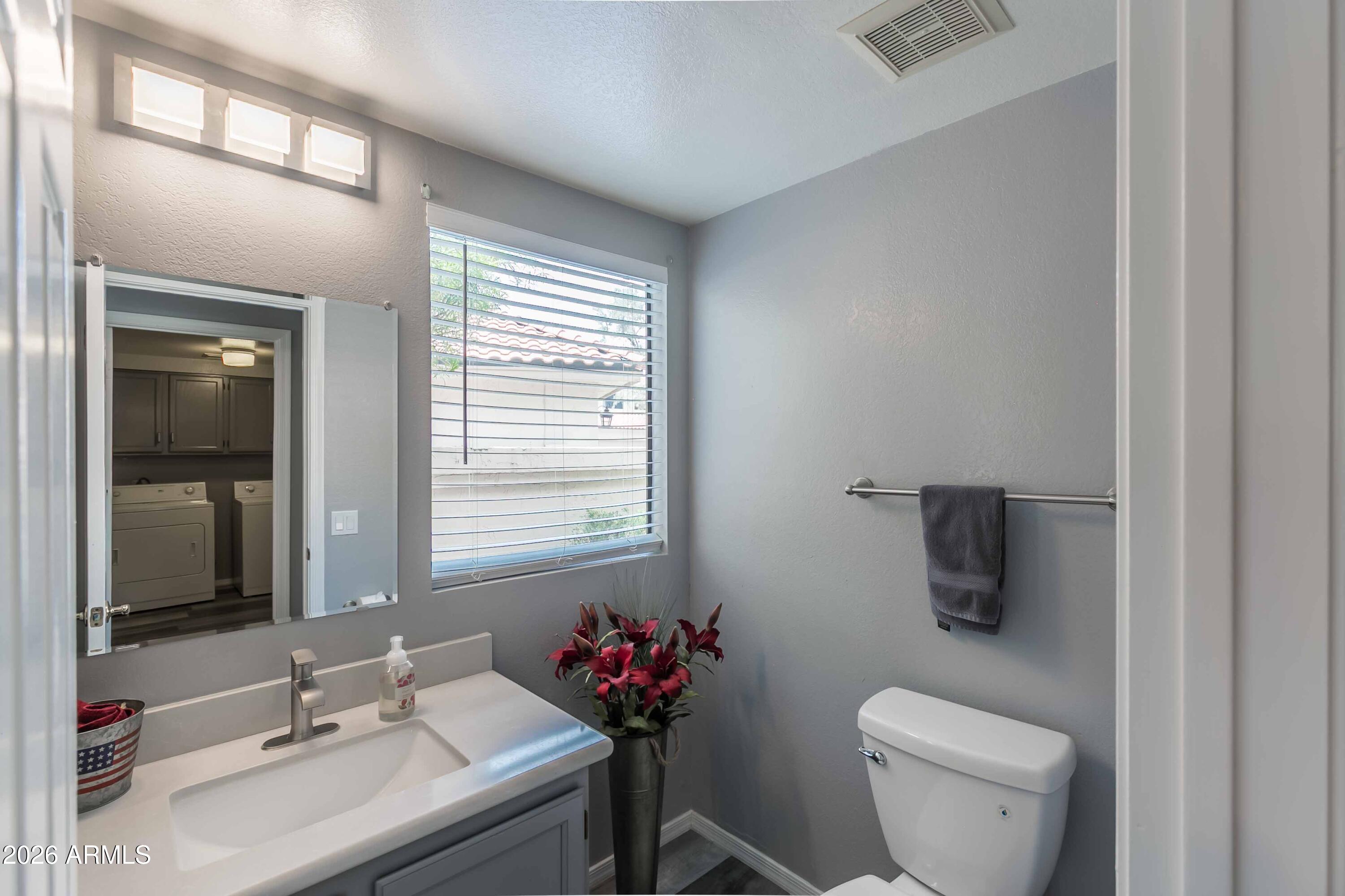 9705 East Mountain View Road, Unit 1107 Scottsdale, AZ 85258 - Photo 8 of 35 Downstairs Powder Room