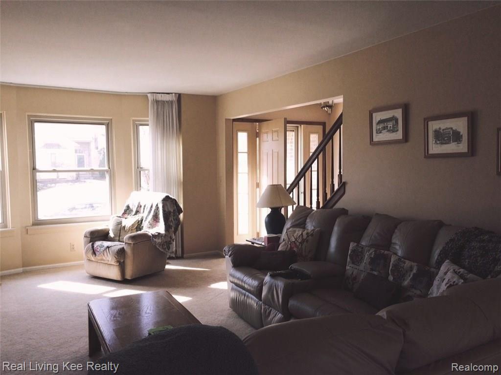 879 Augusta Drive Rochester, MI 48309 - Photo 5 of 37 Living room from dining.jpg