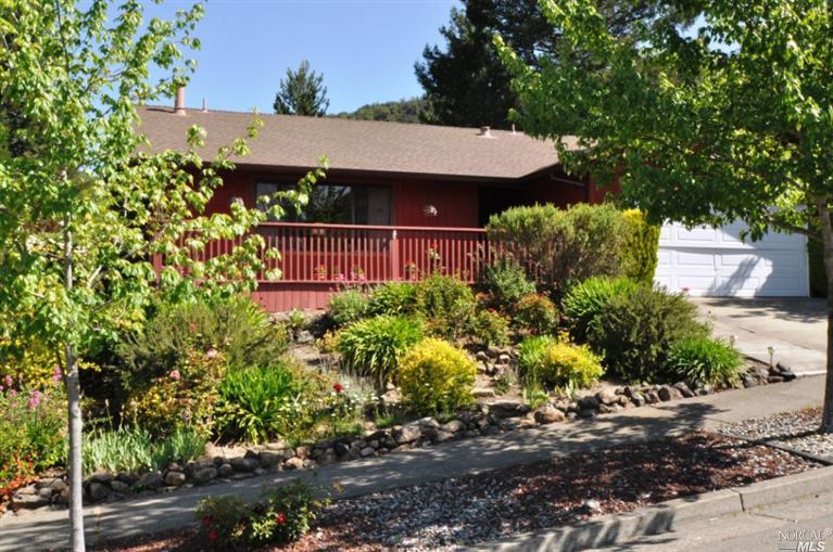 5435 Yerba Buena Road Santa Rosa, CA 95409 - Photo 1 of 1 a view of a garden with plants and large trees