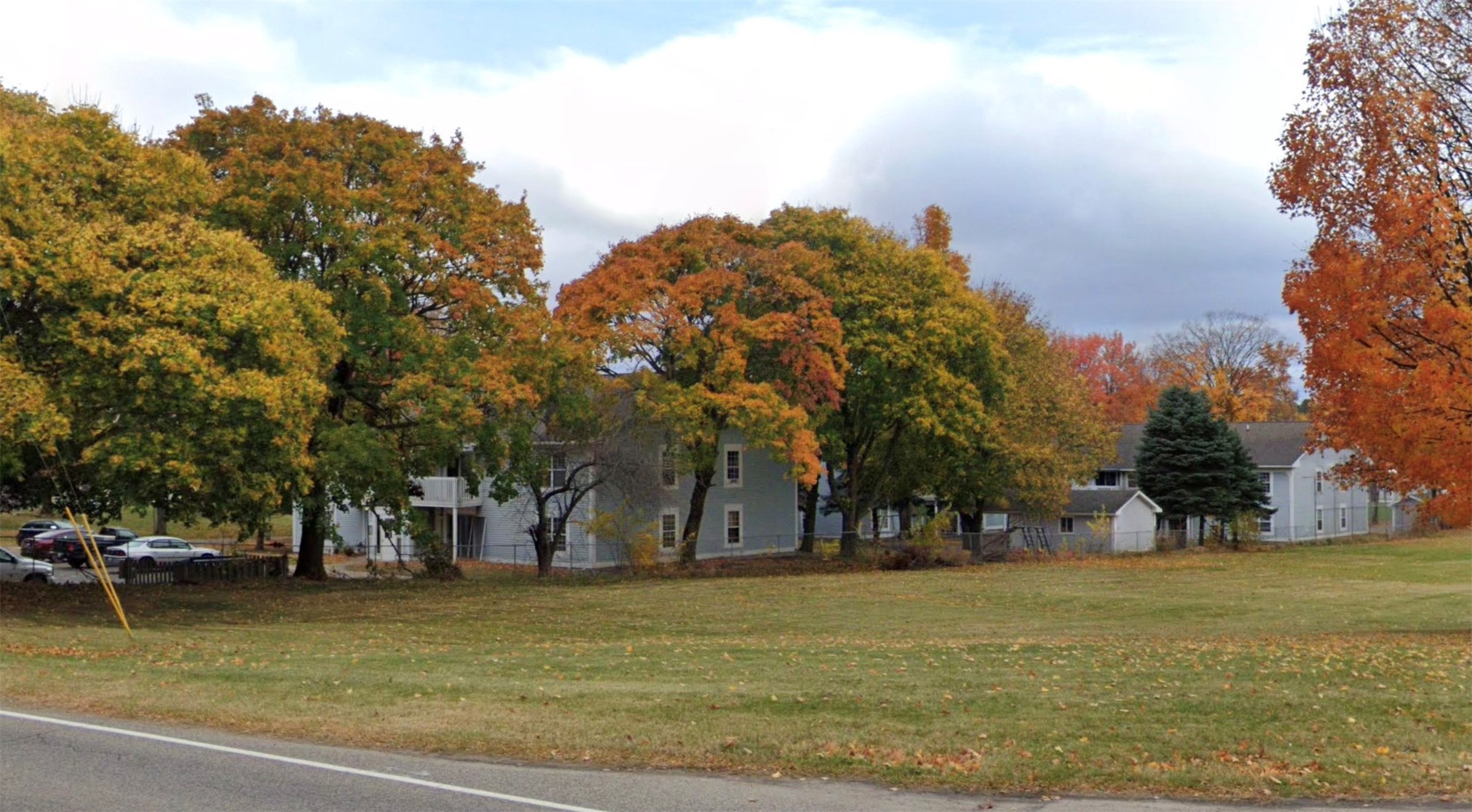 415 North State Street Shelby, MI 49455 - Photo 2 of 5 a view of a park with large trees