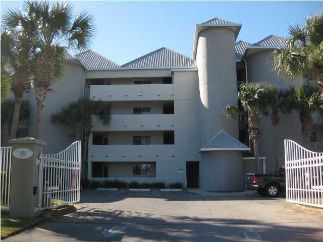 8600 East County Highway 30A, Unit 140 Seacrest, FL 32461 - Photo 2 of 16 a front view of a house with a yard