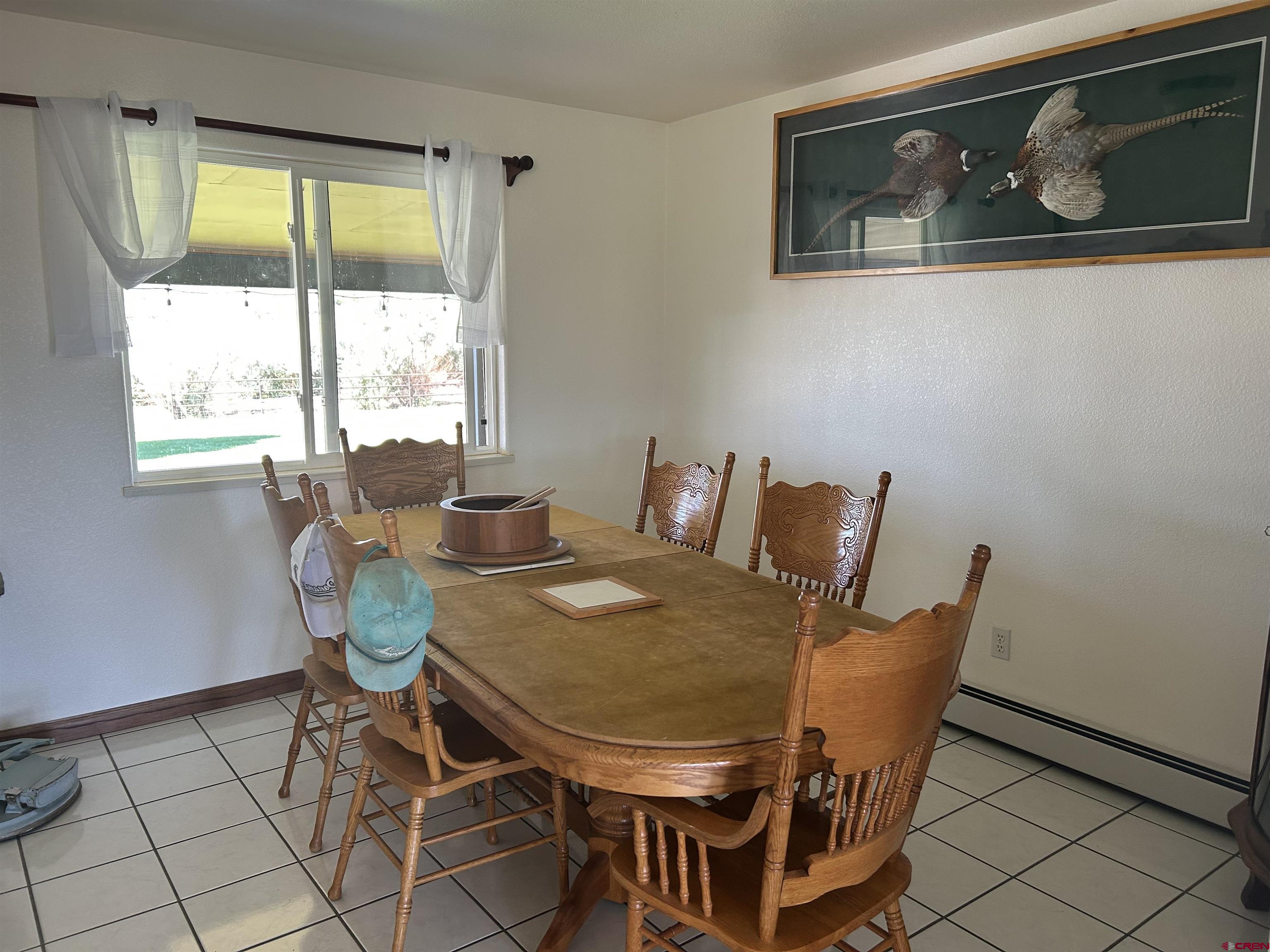 29669 DD Road Nucla, CO 81424 - Photo 13 of 33 a view of a dining room with furniture and window