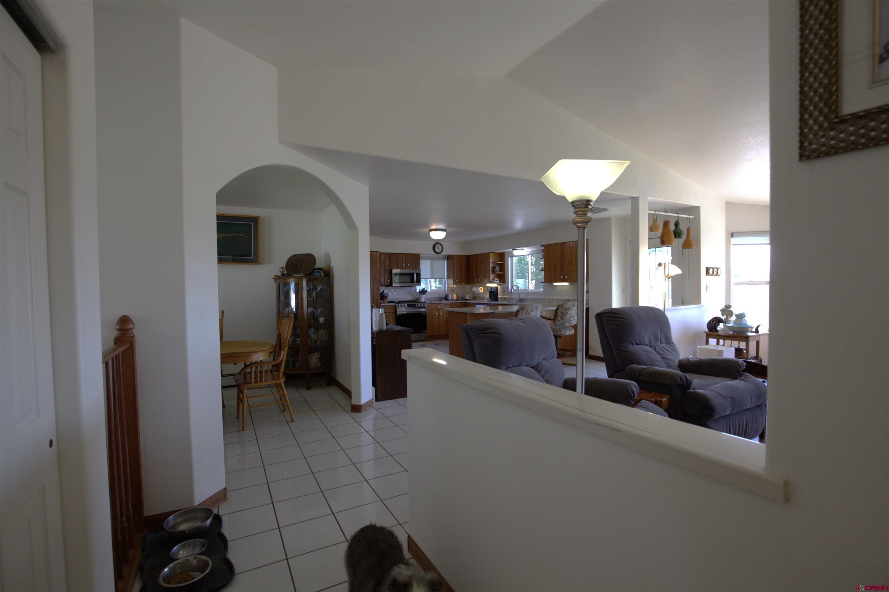 29669 DD Road Nucla, CO 81424 - Photo 15 of 33 a lobby with furniture and a mirror