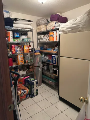 a view of storage and utility room